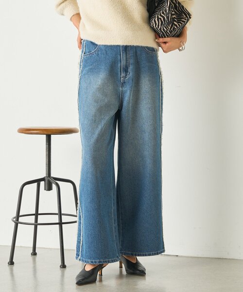 Jena espace merveilleux(ジェナ エスパスメルヴェイユ)の「サイドフリンジデニムパンツ(デニムパンツ・レディース・ブラック/ブルー・FREE)」の1枚目の写真