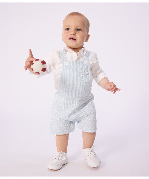 PETIT BATEAU(プチバトー)の「シアサッカーショートサロペット(サロペット/オーバーオール・キッズ・ホワイト×ブルー・36MONTH/24MONTH/12MONTH)」の1枚目の写真