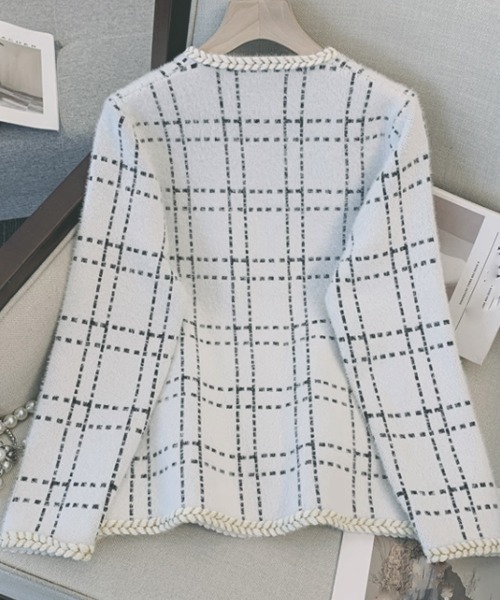 Miniministore(ミニミニストア)の「ツイード風ジャケット アウター 華やか(ノーカラージャケット・レディース・ホワイト/ブラック・FREE)」の11枚目の写真