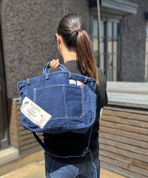 SNOOPY×OLD BETTY'S(スヌーピーカケルオールドベティーズ)の「スヌーピー【SNOOPY】BigPocket Denim 2Way BAG(ショルダーバッグ・レディース・インディゴブルー・FREE)」の1枚目の写真