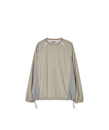 WORTHWHILE MOVEMENT（ワースワイルムーブメント）の「ナイロンプルオーバー（ベージュ）（Tシャツ/カットソー）」