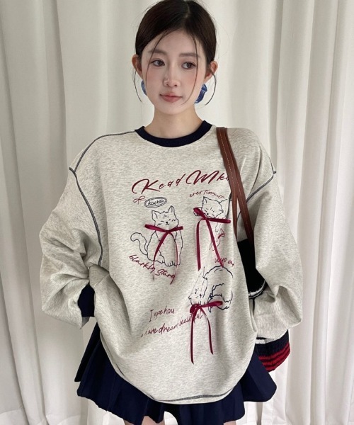 Ritzy(リッツィー)の「キャットプリント オーバーサイズスウェット(スウェット・レディース・ネイビー/グレー・M/L)」の12枚目の写真