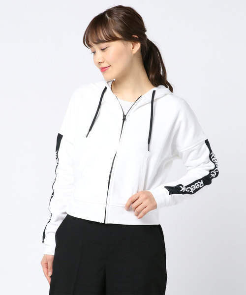 Reebok(リーボック)の「トレーニング エッセンシャルズ リニア ロゴ フーディー / Training Essentials Linear Logo Hoodie(パーカー・レディース・ホワイト/ブラック・SMALL/MEDIUM/LARGE/X-LARGE)」の2枚目の写真