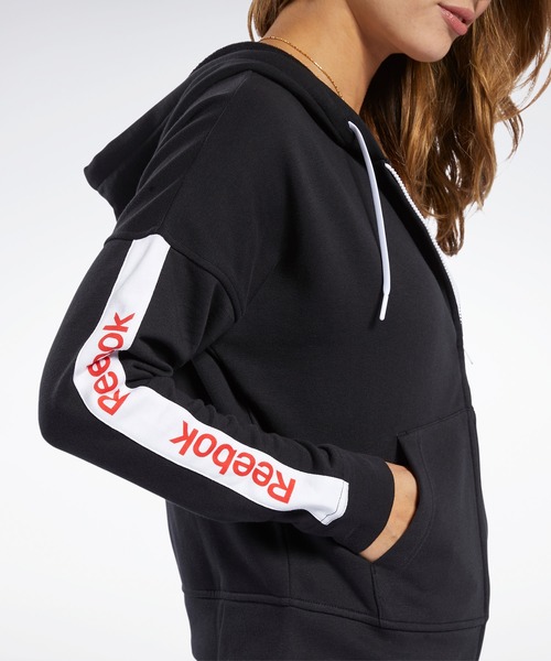 Reebok(リーボック)の「トレーニング エッセンシャルズ リニア ロゴ フーディー / Training Essentials Linear Logo Hoodie(パーカー・レディース・ホワイト/ブラック・SMALL/MEDIUM/LARGE/X-LARGE)」の4枚目の写真