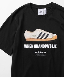 adidas（アディダス）の「【adidas/アディダス】Supergrip ヴィンテージスニーカープリント 半袖Tシャツ/NEW AGE T/アディダスオリジナルス（Tシャツ/カットソー）」