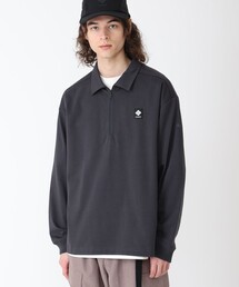 ハーフジップ」に該当するレディースのポロシャツファッション