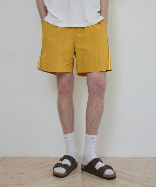 WEDNESDAY OASIS（ウェンズデーオアシス）の「ワンマイルトラックショートパンツ_YELLOW(W25-PT15)（その他パンツ・メンズ・イエロー・MEDIUM/LARGE）」の2枚目の写真