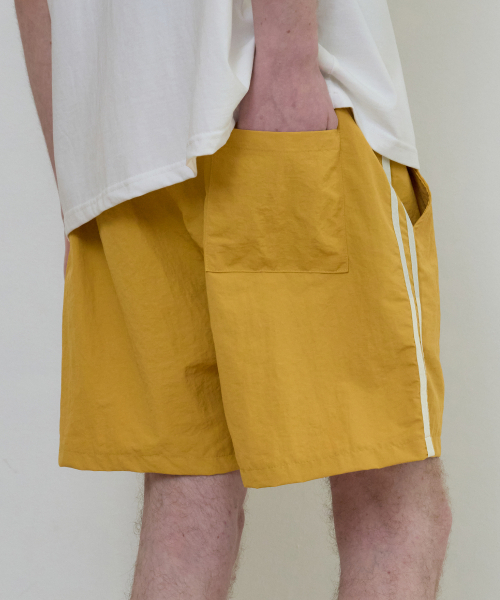 WEDNESDAY OASIS（ウェンズデーオアシス）の「ワンマイルトラックショートパンツ_YELLOW(W25-PT15)（その他パンツ・メンズ・イエロー・MEDIUM/LARGE）」の3枚目の写真