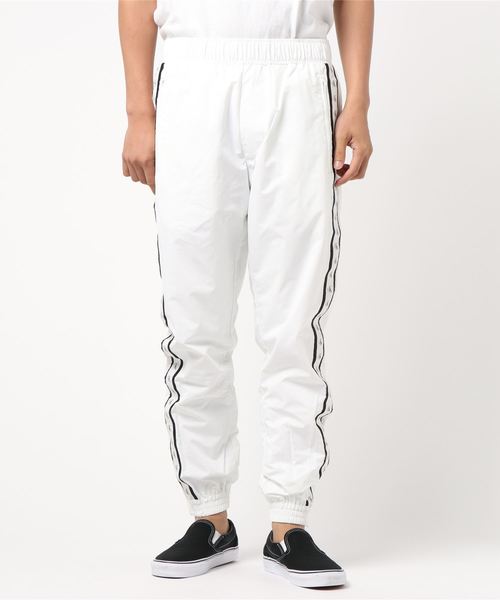 Calvin Klein Jeans(カルヴァンクラインジーンズ)の「モノグラム サイド ロゴ テープ ジョガー パンツ(その他パンツ・メンズ・ブラック/ホワイト系その他・S/M/L)」の2枚目の写真