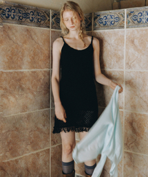 ANDNEEDS（アンドニーズ）の「Luna fringe knit dress (black)（ワンピース）」