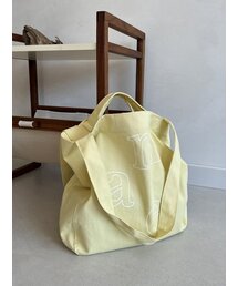 MUCU AND EBONY（ムクアンドエボニー）の「m.a.e Logo Bag _ Lemon Yellow（ショルダーバッグ）」