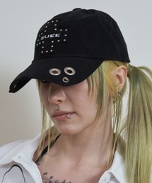 SETUPEXE（セットアップイーエックスイー）の「A'GEM/9 × .kom 『SETUPEXE/セットアップイーエックスイー』CROSS LOGO EYELET BALL CAP/クロスロゴアイレットボールキャップ（キャップ）」