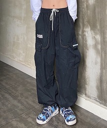 A'GEM/9 × .kom｜エージェムナイン（メンズ）のカーゴパンツ（ブラック