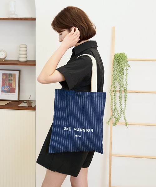 UNE MANSION(ユヌマンション)の「【UNE MADE】UNE MANSION ロゴデニムトートバッグ(トートバッグ・レディース・ブルー/ライトブルー・ONE SIZE)」の1枚目の写真