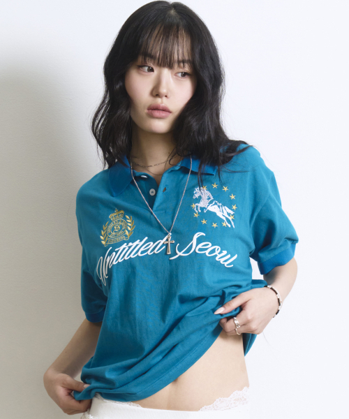 UNTITLED SEOUL(アンタイトル ソウル)の「アンタイトルクレストポロクロップ半袖フルブルー(Tシャツ/カットソー・レディース・その他・MEDIUM/LARGE)」の1枚目の写真