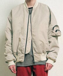 SCHISM INDUCING（スキズムインデューシング）の「PACK POCKET MA-1 JUMPER, PINKY CREAM（ブルゾン）」