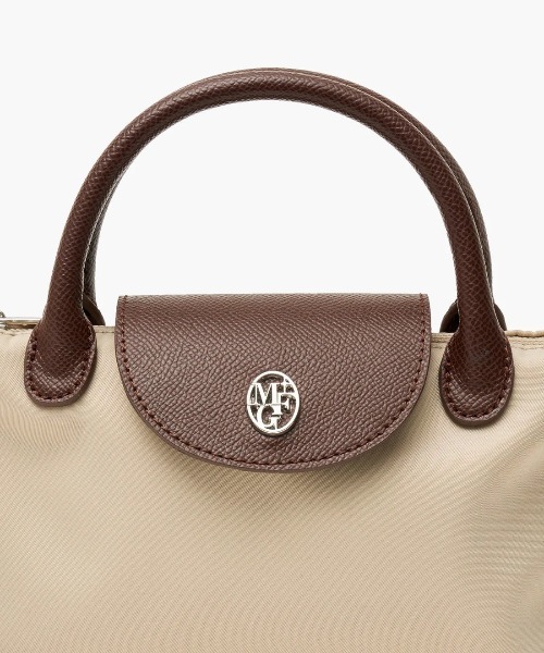 MARITHE + FRANCOIS GIRBAUD（マリテフランソワジルボー）の「CIRCLE LOGO MINI TOTE BAG（トートバッグ・レディース・インディゴブルー/Black/ライトベージュ・フリー）」の11枚目の写真