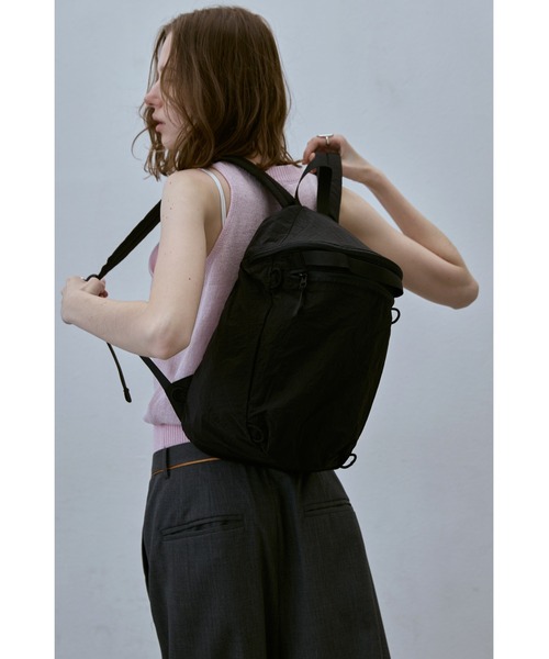 un/neu(アンノイ)の「リップストップコンパクトデイパック / リュック / A4、PC収納可能(14inch)(バックパック/リュック・レディース・ブルー/アイボリー/ブラック・FREE)」の14枚目の写真