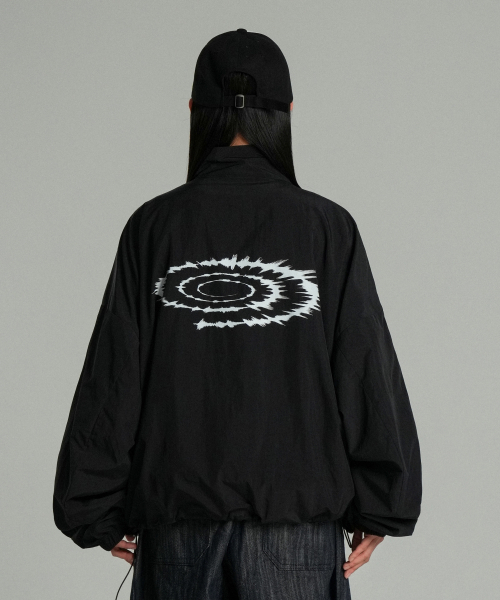 IDWS(アイドンワナセル)の「Swift Symbol Track Jacket Black(ナイロンジャケット・レディース・その他・1/2)」の10枚目の写真