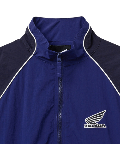 PHYPS MOTORCYCLE(フィップスモーターサイクル)の「Nylon Vintage Color Block Track Jacket Blue(ナイロンジャケット・レディース・その他・SMALL/MEDIUM/LARGE/X-LARGE)」の4枚目の写真