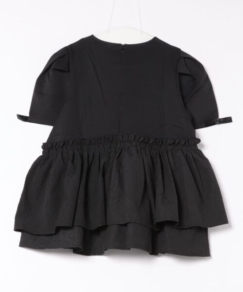 O.S.K（オーエスケー）の「[O.S.K] アシメペプラムジャガードトップス（シャツ/ブラウス・レディース・ブラック/ホワイト・FREE）」の3枚目の写真