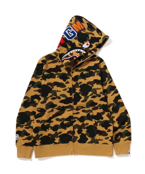 A BATHING APE(アベイシングエイプ)の「1ST CAMO SHARK FULL ZIP HOODIE(パーカー・メンズ・グリーン/イエロー・XXX-LARGE/MEDIUM/LARGE/X-LARGE/XX-LARGE/SMALL)」の1枚目の写真