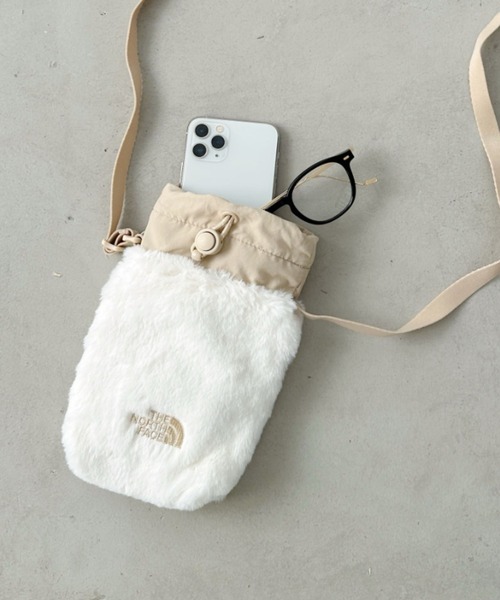 THE NORTH FACE(ザノースフェイス)の「国内未発売 THE NORTH FACE(ザ・ノースフェイス)/ストリングギャザーミニファーショルダー スマホショルダー ポーチ/GIRLS FUR CROSS BAG(ショルダーバッグ・レディース・クリーム/ブラック/ピンク・FREE)」の1枚目の写真