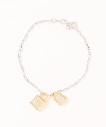 MICHAEL KORS（マイケルコース）の「シルバー ペーパークリップ チェーン ブレスレット ウィズ ゴールド パヴェ アンド ホワイト ロック（ブレスレット）」