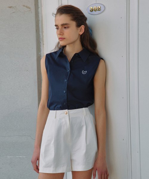 ROLAROLA(ロラロラ)の「LOGO SLEEVELESS SHIRTS NAVY(シャツ/ブラウス・レディース・ネイビー・FREE)」の1枚目の写真