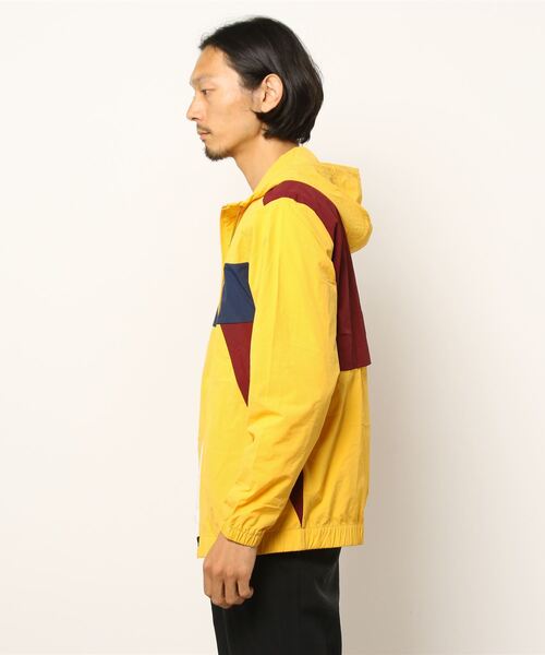 NEW BALANCE（ニューバランス）の「NB Athletics Higher Learning  ウインドブレーカージャケット（ナイロンジャケット・メンズ・イエロー/ブルー/ブラック・SMALL/MEDIUM/LARGE/X-LARGE/XX-LARGE）」の5枚目の写真