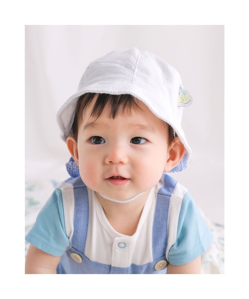 SLAP SLIP BABY（スラップスリップベビー）の「SLAPSLIPBABY/無地恐竜総柄日よけ付ハットベビー(46~48cm)（ハット・キッズ・ブルー系その他/ホワイト系その他・46/48）」の2枚目の写真