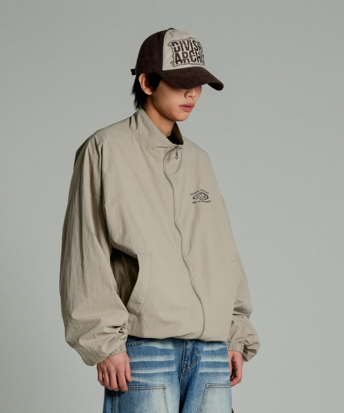 IDWS(アイドンワナセル)の「Swift Symbol Track Jacket Beige(ナイロンジャケット・レディース・その他・1/2)」の4枚目の写真