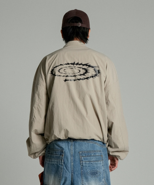 IDWS(アイドンワナセル)の「Swift Symbol Track Jacket Beige(ナイロンジャケット・レディース・その他・1/2)」の5枚目の写真