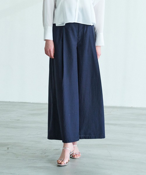 N.O.R.C(ノーク)の「ブライトローン撥水フレアパンツ【AIRY MOTION】(スラックス・レディース・ベージュ/ネイビー・S/M)」の1枚目の写真