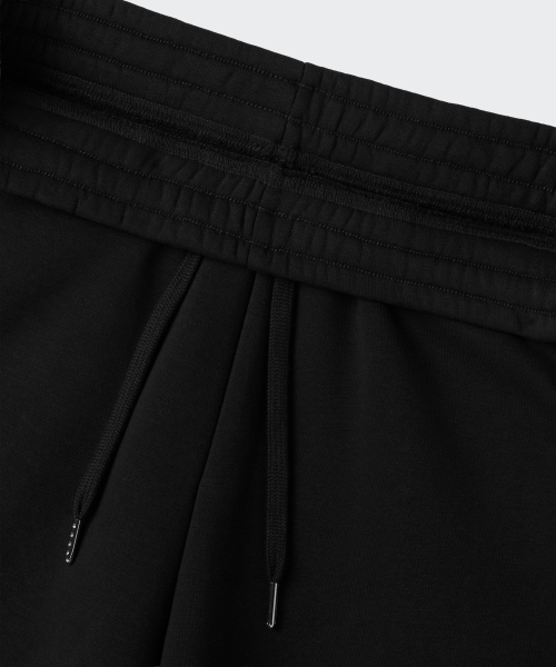MUSINSA STANDARD WOMAN（ムシンサスタンダードウーマン）の「ウィメンズ起毛カーブドスウェットパンツ[ブラック]（その他パンツ・レディース・その他・LARGE/MEDIUM/SMALL/X-SMALL）」の4枚目の写真