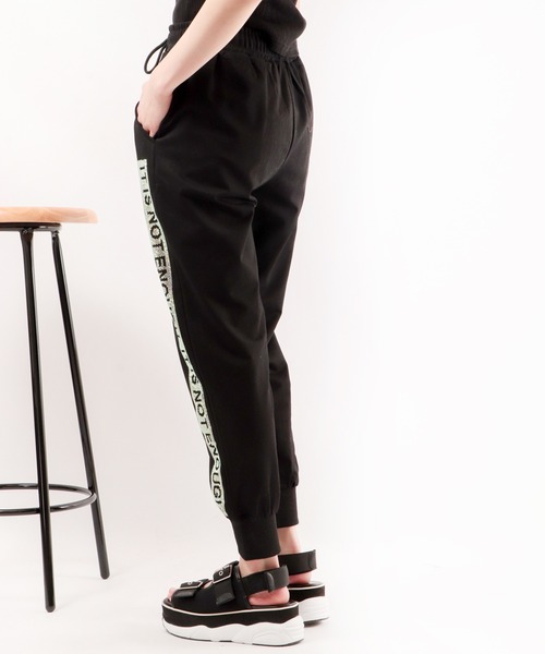 BLACK JACKALL CROWN(ブラックジャッカルクラウン)の「BLACK JACKALL CROWN ポンチ サイドジルコンプリント ジョガー トラックパンツ(その他パンツ・レディース・ブラック・M)」の7枚目の写真