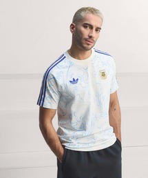 adidas（アディダス）の「アルゼンチン代表 オリジナルス オールオーバープリント Tシャツ / アディダス adidas（Tシャツ/カットソー）」