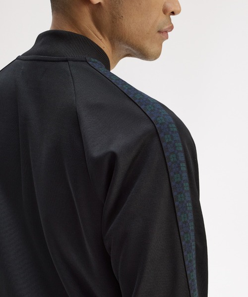 FRED PERRY（フレッドペリー）の「Black Watch Tartan Taped Track