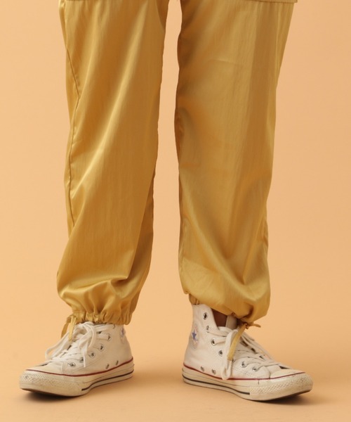 AVIREX（アヴィレックス）の「VINTAGE SATIN STRETCH PANTS/ ヴィンテージサテンストレッチパンツ（その他パンツ・レディース・アイボリー/ベビーピンク/マスタード・SMALL/MEDIUM）」の9枚目の写真