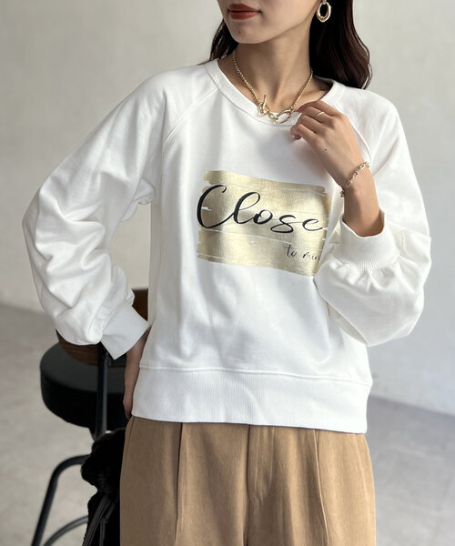 Chez toi(シェトワ)の「箔プリント裏毛ラグランプルオーバー(Tシャツ/カットソー・レディース・ブルー/オフホワイト/ブラック・FREE)」の7枚目の写真