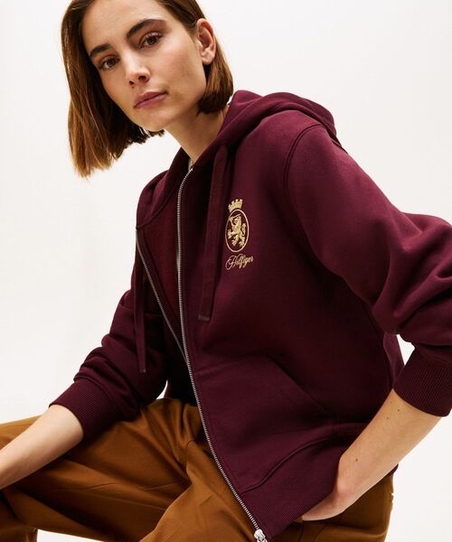 TOMMY HILFIGER（トミーヒルフィガー）の「ゴールドクレストテリージップスルーパーカー（スウェット・レディース・バーガンディー/ネイビー・MEDIUM/SMALL/X-SMALL）」の7枚目の写真