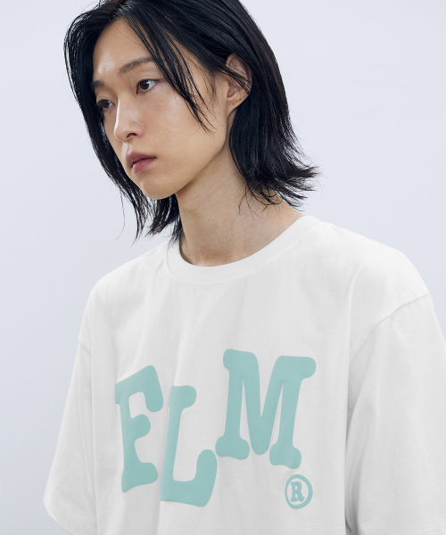 F.ILLUMINATE(フィルミネイト)の「FLMウェイビーロゴTシャツ - ホワイト(Tシャツ/カットソー・レディース・その他・SMALL/MEDIUM/LARGE)」の4枚目の写真