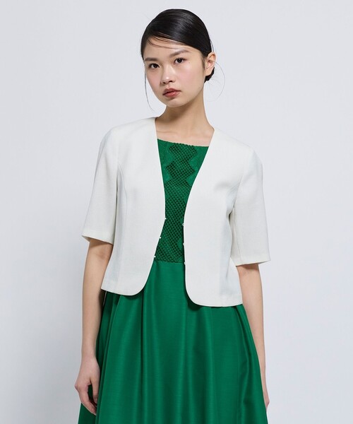 TOCCA(トッカ)の「BRIGHT BREEZE 半袖ショートジャケット(ノーカラージャケット・レディース・アイボリー系/ネイビー系・0/2/4/6)」の6枚目の写真