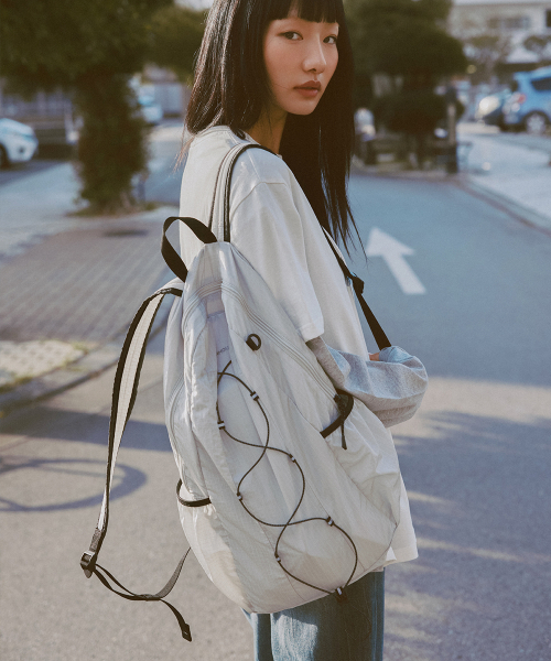 AFTERHOURS(アフターアワーズ)の「LIGHT STRING BACKPACK (CLOUDY GREY)(バックパック/リュック・レディース・その他・FREE)」の1枚目の写真