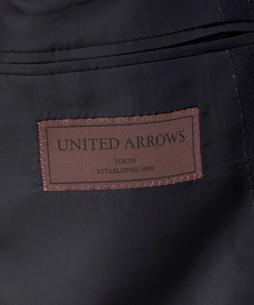UNITED ARROWS(ユナイテッドアローズ)の「ネイビー ストライプ ダブル 6ボタン スーツ MCーMODEL ヨコストレッチ(セットアップ・メンズ・ネイビー・44/48/46)」の11枚目の写真