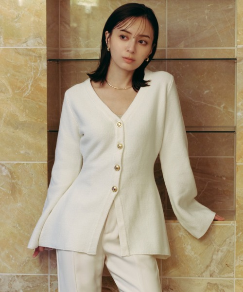 anuans（アニュアンス）の「ウエストシェイプペプラムニットジャケット