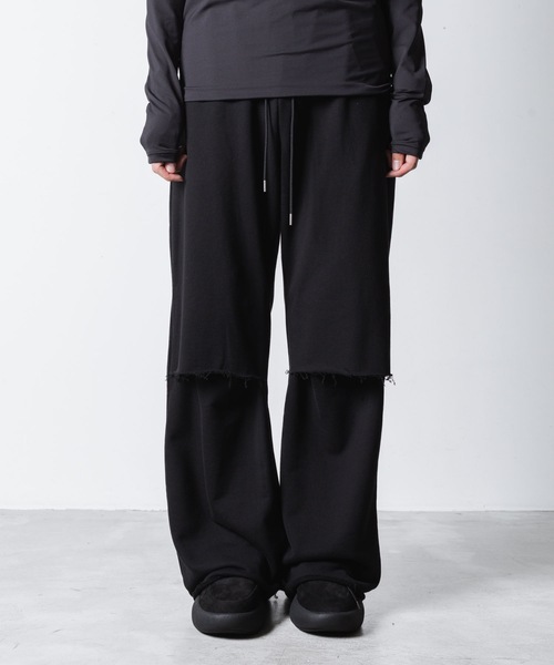 VEIN (ヴェイン)の「ジャンベルカテリー カットオフ バギートラウザーズ / JUMBERCA TERRY CUT OFF BAGGY TROUSERS(スウェットパンツ・メンズ・ブラック・2/1)」の1枚目の写真