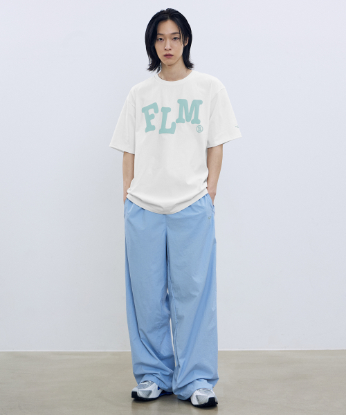 F.ILLUMINATE（フィルミネイト）の「FLMウェイビーロゴTシャツ - ブラック（Tシャツ/カットソー・レディース・その他・SMALL/MEDIUM/LARGE）」の6枚目の写真