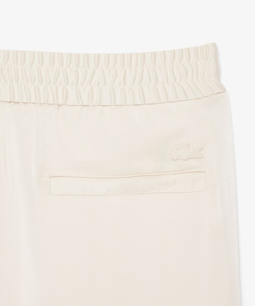 LACOSTE（ラコステ）の「シルキーフェイストラックパンツ（スウェットパンツ・レディース・オフホワイト・36/34/38）」の10枚目の写真