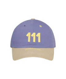 HONGWOOSUNG（ホンウソン）の「ナンバー111 ボールキャップ_パープル＆ベージュ（キャップ）」
